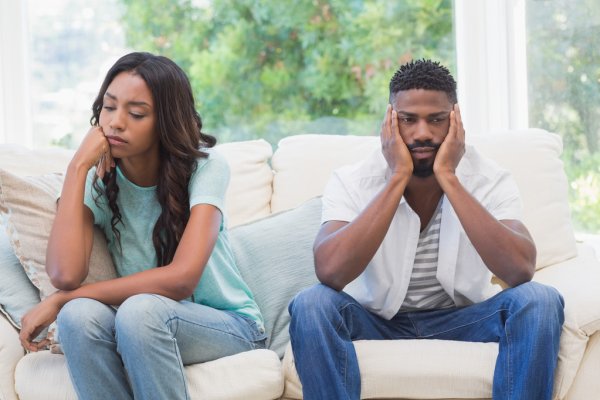 depositphotos_81754948-stock-photo-couple-having-argument-on-couch